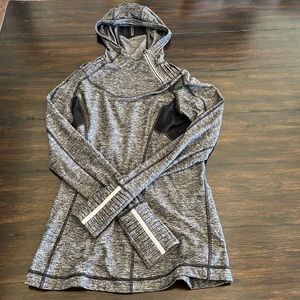 Lululemon pullover jacket with hood.